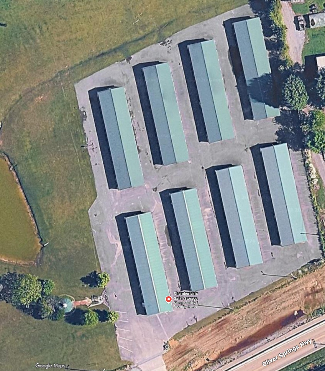 Aerial view of eight storage buildings and the paved aisles between them